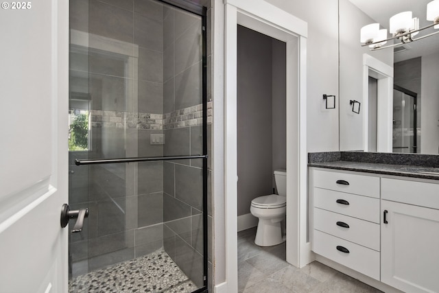 5360 NW 18th Ave, Camas, WA 98607 - bathroom with a shower stall, toilet, vanity, and a chandelier