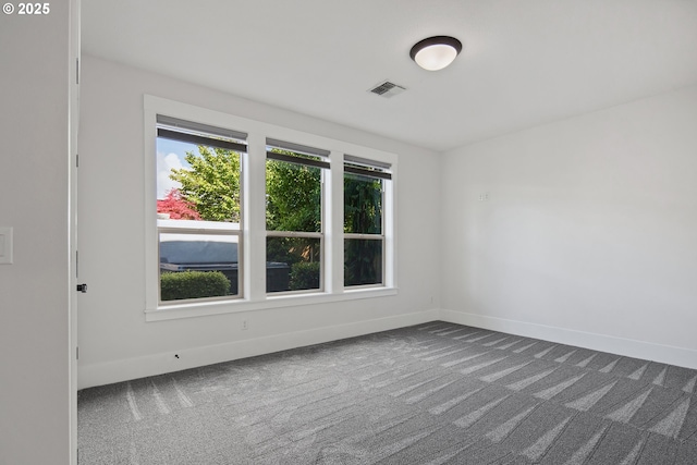 5360 NW 18th Ave, Camas, WA 98607 - spare room with dark colored carpet and baseboards