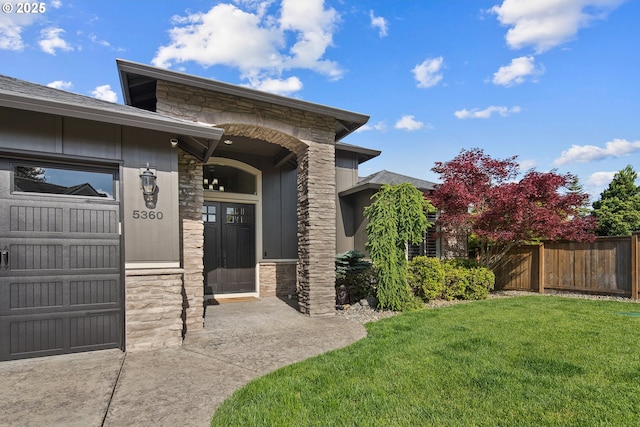5360 NW 18th Ave, Camas, WA 98607 - doorway to property with stone siding and a garage