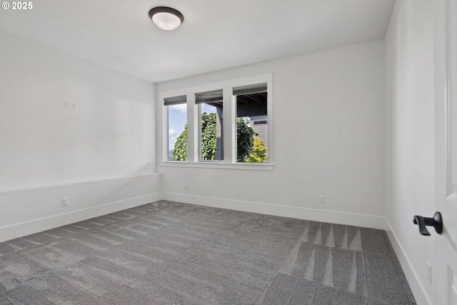 5360 NW 18th Ave, Camas, WA 98607 - spare room with dark carpet and baseboards