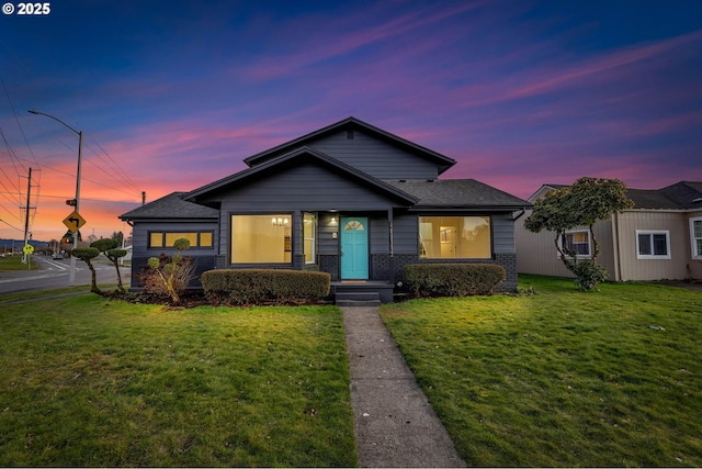 view of front of house featuring a lawn