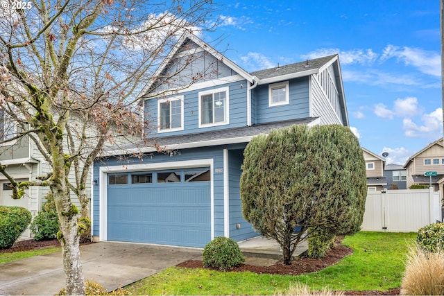 view of front facade featuring concrete driveway, roof with shingles, an attached garage, and fence