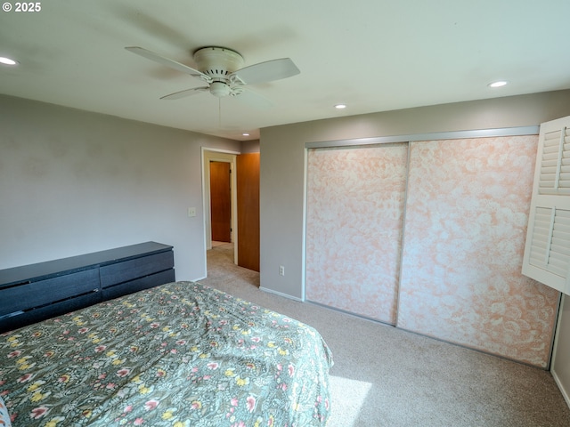 unfurnished bedroom with a ceiling fan, recessed lighting, a closet, carpet flooring, and baseboards