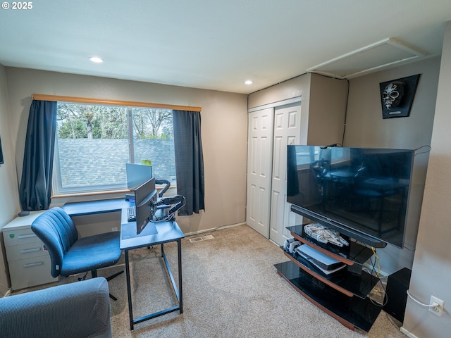 carpeted office with recessed lighting and visible vents