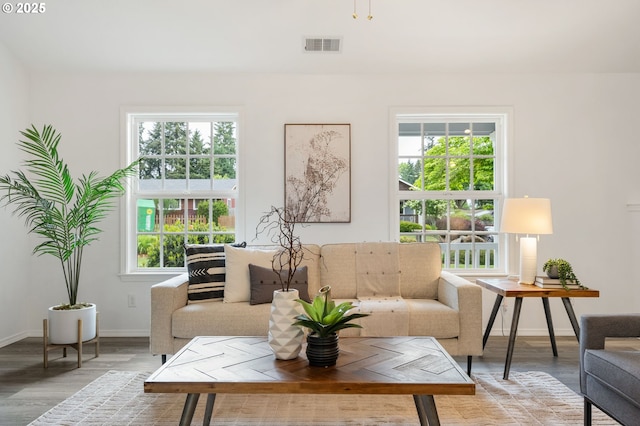 living room with light wood-style floors and baseboards