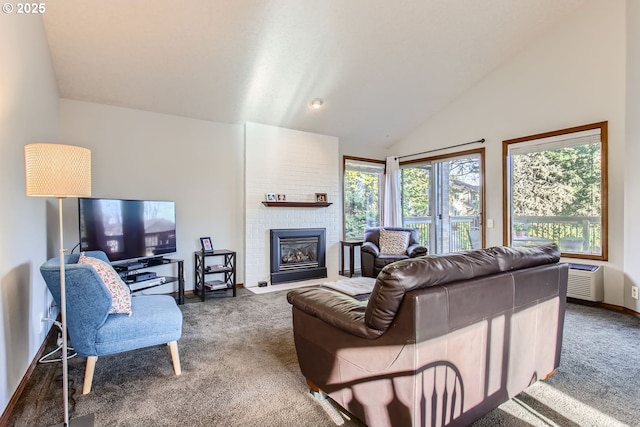 carpeted living room featuring an AC wall unit, a large fireplace, and vaulted ceiling