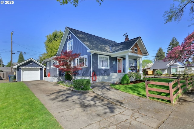683 Laurel, Junction City, OR 97448 - bungalow-style home with an outdoor structure, a chimney, a porch, asphalt driveway, and a garage