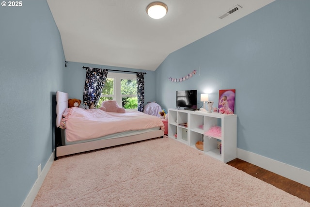 683 Laurel, Junction City, OR 97448 - bedroom with lofted ceiling, baseboards, and wood finished floors