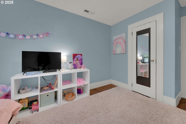683 Laurel, Junction City, OR 97448 - recreation room featuring baseboards and wood finished floors