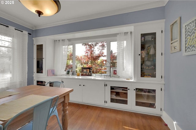 683 Laurel, Junction City, OR 97448 - bar area with ornamental molding and light wood-type flooring