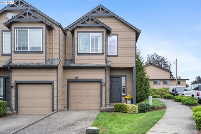 5862 SE Woodland Dr, Gresham, OR 97080 - view of property with a garage and aphalt driveway