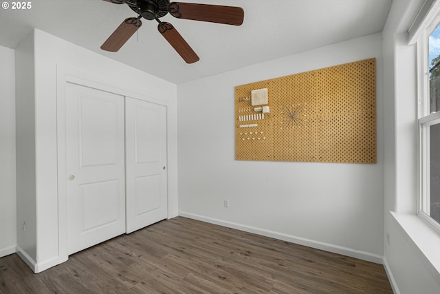 12115 NE 40th Cir, Vancouver, WA 98682 - unfurnished bedroom with wood finished floors, a closet, a ceiling fan, and baseboards