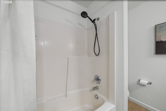 12115 NE 40th Cir, Vancouver, WA 98682 - full bathroom featuring shower / bath combo, toilet, baseboards, and tile patterned floors