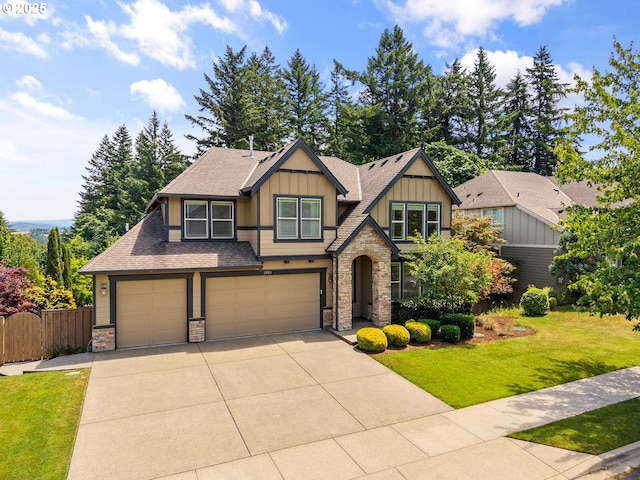2814 NW Hill St, Camas, WA 98607 - craftsman-style house featuring stone siding, board and batten siding, concrete driveway, and a garage