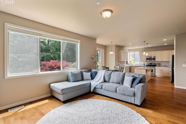 2814 NW Hill St, Camas, WA 98607 - living room featuring wood finished floors and recessed lighting