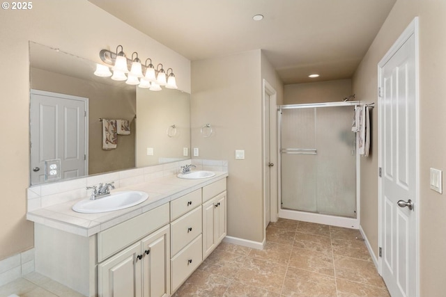2814 NW Hill St, Camas, WA 98607 - bathroom with double vanity, a shower stall, and recessed lighting