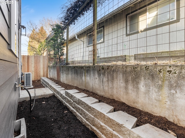 view of yard featuring central AC unit