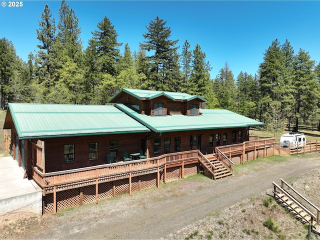 view of front of home with metal roof and covered porch