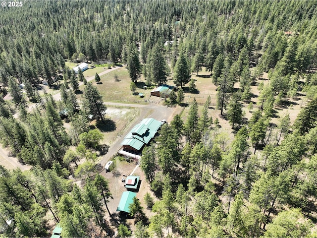 drone / aerial view with a forest view