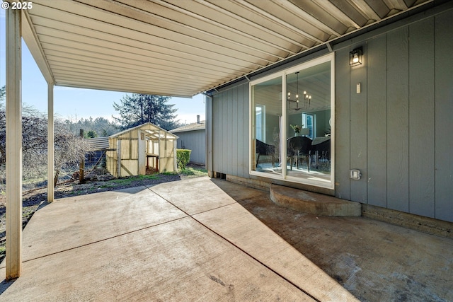 view of patio with a storage unit