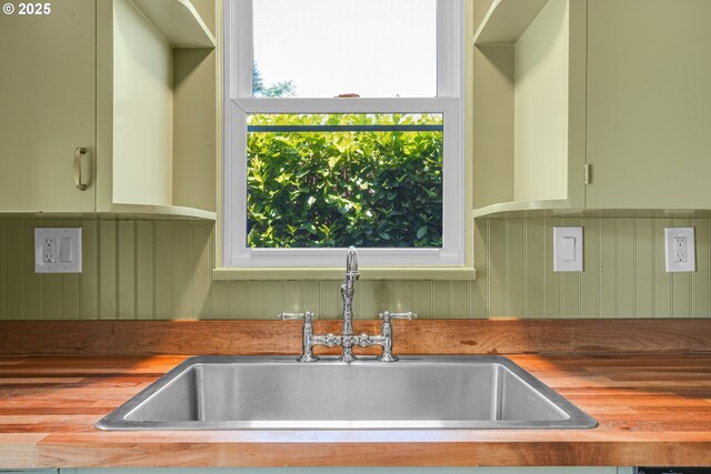 1605 NE 76th Ave, Portland, OR 97213 - kitchen featuring a sink and wood counters