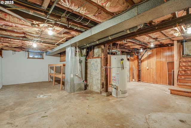 1605 NE 76th Ave, Portland, OR 97213 - below grade area with water heater, stairs, and heating unit