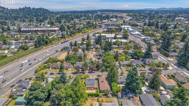 1605 NE 76th Ave, Portland, OR 97213 - aerial view of property and surrounding area with a mountain backdrop and nearby suburban area