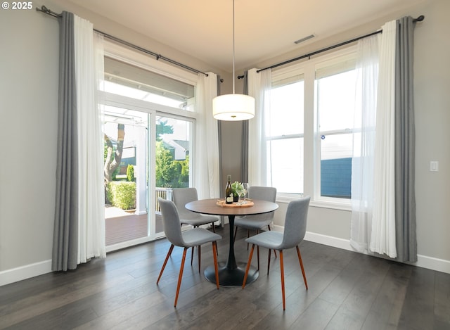 16922 NW Madrone St, Portland, OR 97229 - dining space with baseboards and dark wood finished floors