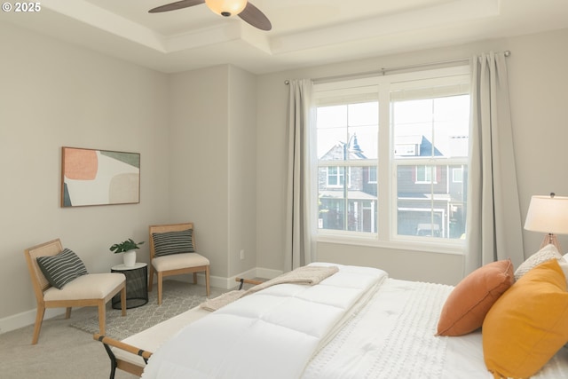 16922 NW Madrone St, Portland, OR 97229 - bedroom featuring a raised ceiling, baseboards, carpet, and ceiling fan