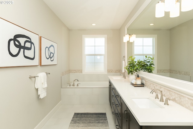 16922 NW Madrone St, Portland, OR 97229 - full bath featuring a garden tub, double vanity, recessed lighting, baseboards, and tile patterned floors