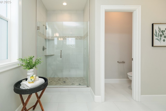 16922 NW Madrone St, Portland, OR 97229 - full bath with a shower stall, toilet, baseboards, tile patterned flooring, and recessed lighting