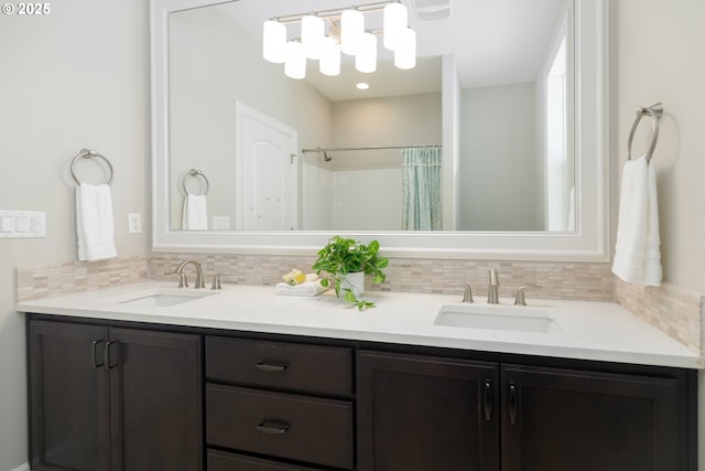 16922 NW Madrone St, Portland, OR 97229 - full bath with double vanity, decorative backsplash, and curtained shower