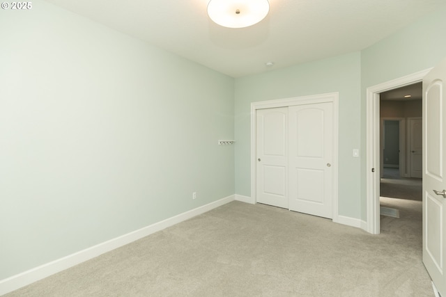 16922 NW Madrone St, Portland, OR 97229 - unfurnished bedroom with carpet, baseboards, and a closet