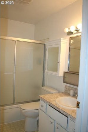 14737 SW Hall Blvd, Tigard, OR 97224 - bathroom with toilet, vanity, and enclosed tub / shower combo