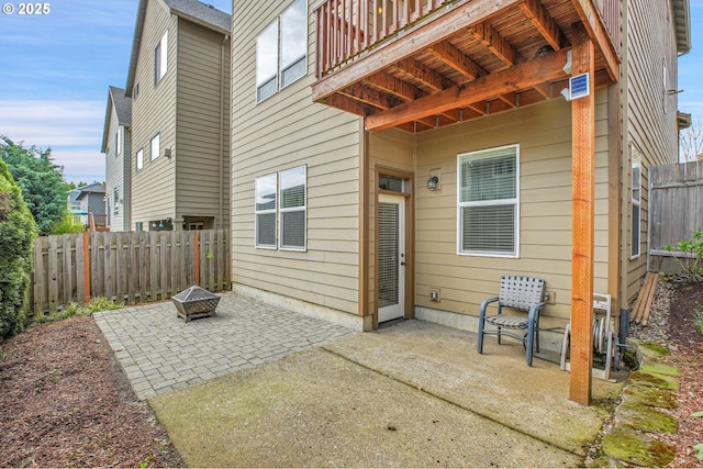 14670 SW 78th Ave, Tigard, OR 97224 - back of property featuring an outdoor fire pit, a patio, and a fenced backyard