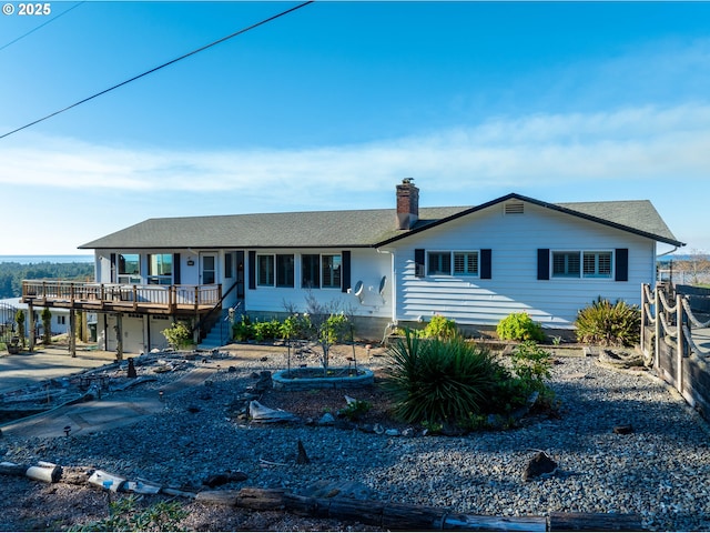 335 Sunset Dr, Reedsport, OR 97467 - view of front of home with a wooden deck