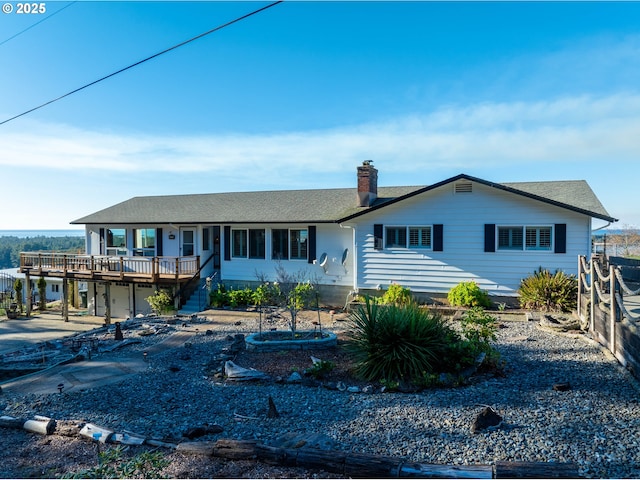 view of front of home with a wooden deck