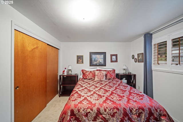 bedroom with light carpet