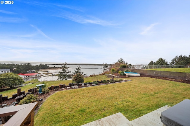 view of yard featuring a water view