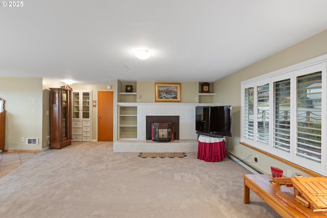 carpeted living room with a baseboard heating unit