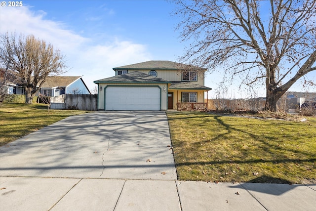 view of front of home featuring a garage and a front yard