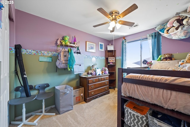 bedroom with ceiling fan and light colored carpet