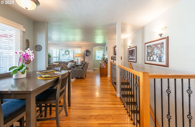 2507 NE 59th St, Vancouver, WA 98663 - dining space with light wood finished floors, arched walkways, and baseboards