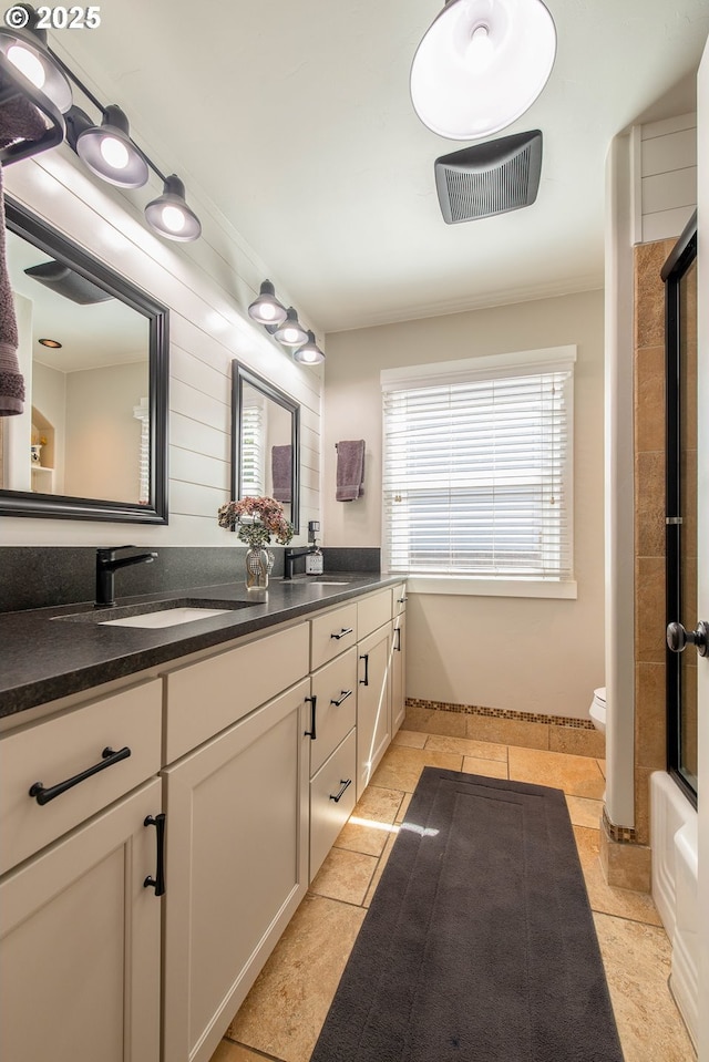 2507 NE 59th St, Vancouver, WA 98663 - full bath featuring double vanity, crown molding, toilet, a shower, and baseboards
