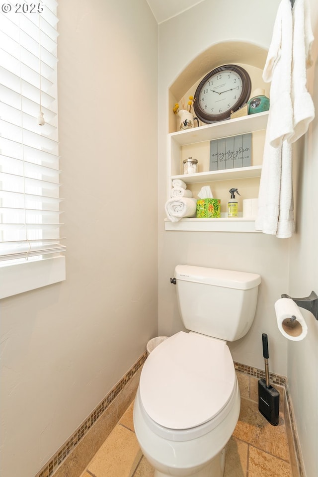 2507 NE 59th St, Vancouver, WA 98663 - half bath with baseboards, toilet, and stone tile floors
