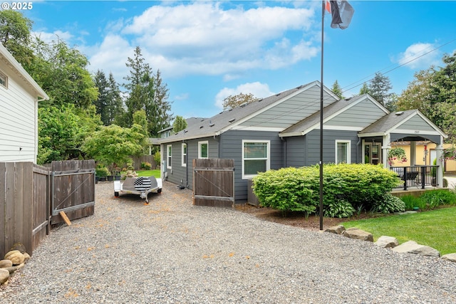 2507 NE 59th St, Vancouver, WA 98663 - view of front facade with fence and a gate