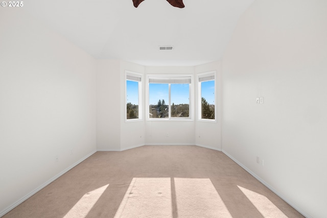 carpeted empty room with ceiling fan