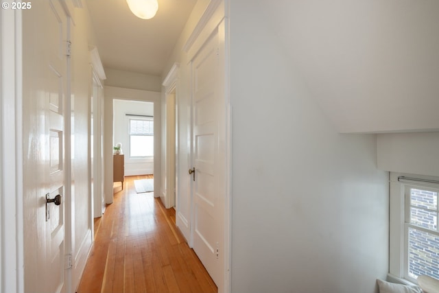 hallway with light wood finished floors