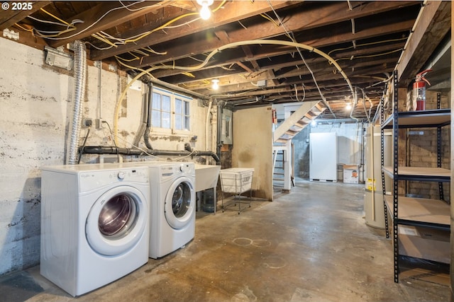 below grade area featuring separate washer and dryer