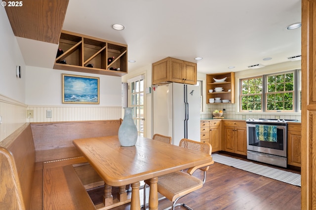 4445 Independence Ave, Neskowin, OR 97149 - dining room featuring a wainscoted wall, wood finished floors, and recessed lighting
